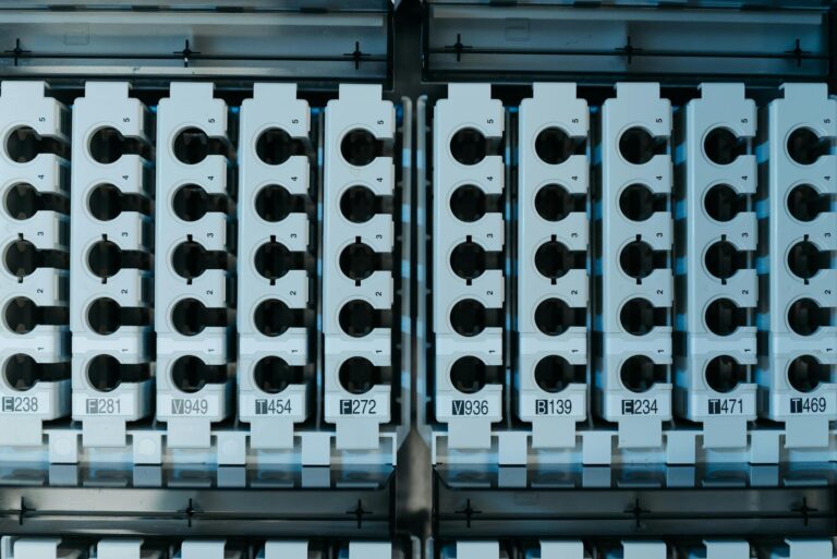 Close-up of industrial circuit connectors with numerical labels in a grid arrangement.