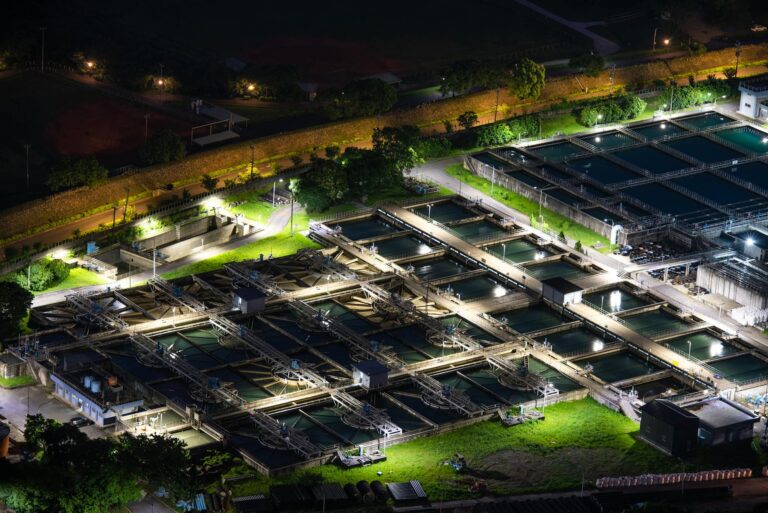 An aerial night view of a lit water treatment facility in Sanxia, Taiwan.